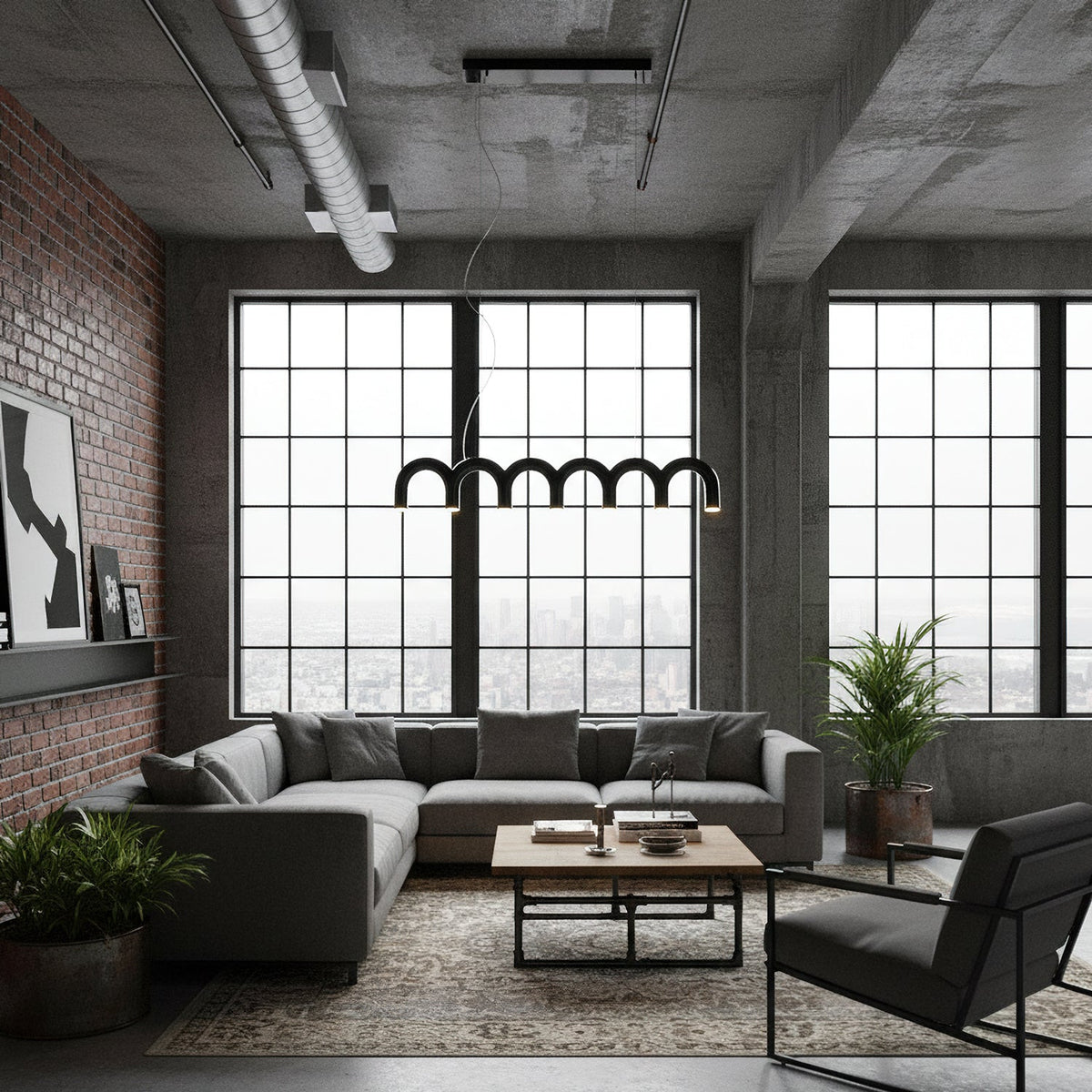 A row of black arches from this Clérachic chandelier hangs in front of tall steel windows, above a loft living room.