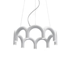 A white tiered-arch Clérachic chandelier, with its lights facing down and a curved cord at the top, on white.