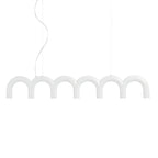 A white row of arches from this Clérachic chandelier, hung on a curved cord and a thin cable, on a white backdrop.