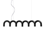 A black arched Clérachic chandelier with a glossy finish, hung on a curved cord and a thin cable, on white.