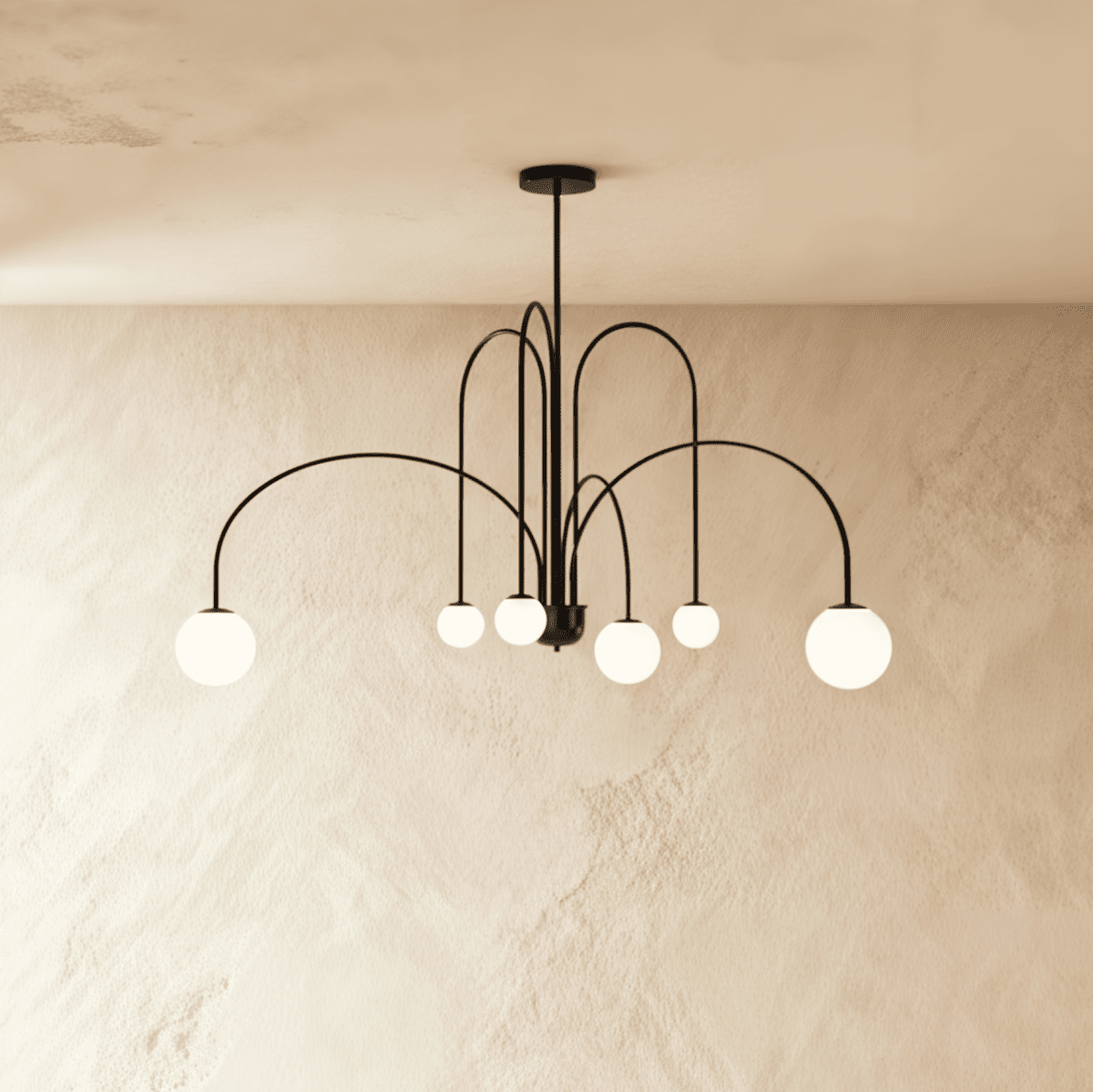 This Clérachic black Art Deco chandelier spreads its looped arms wide, each ending in a round glass globe.