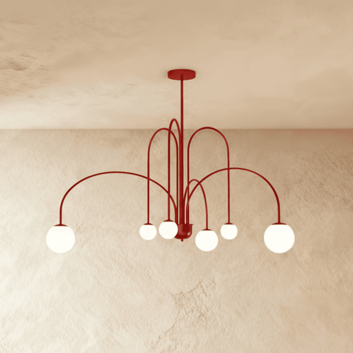 Clérachic's red Art Deco chandelier curves six arms outward, each ending in a glowing white glass globe.