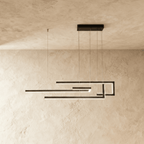 Clérachic's chandelier in black, its interlocking linear bars forming a geometric maze suspended overhead.