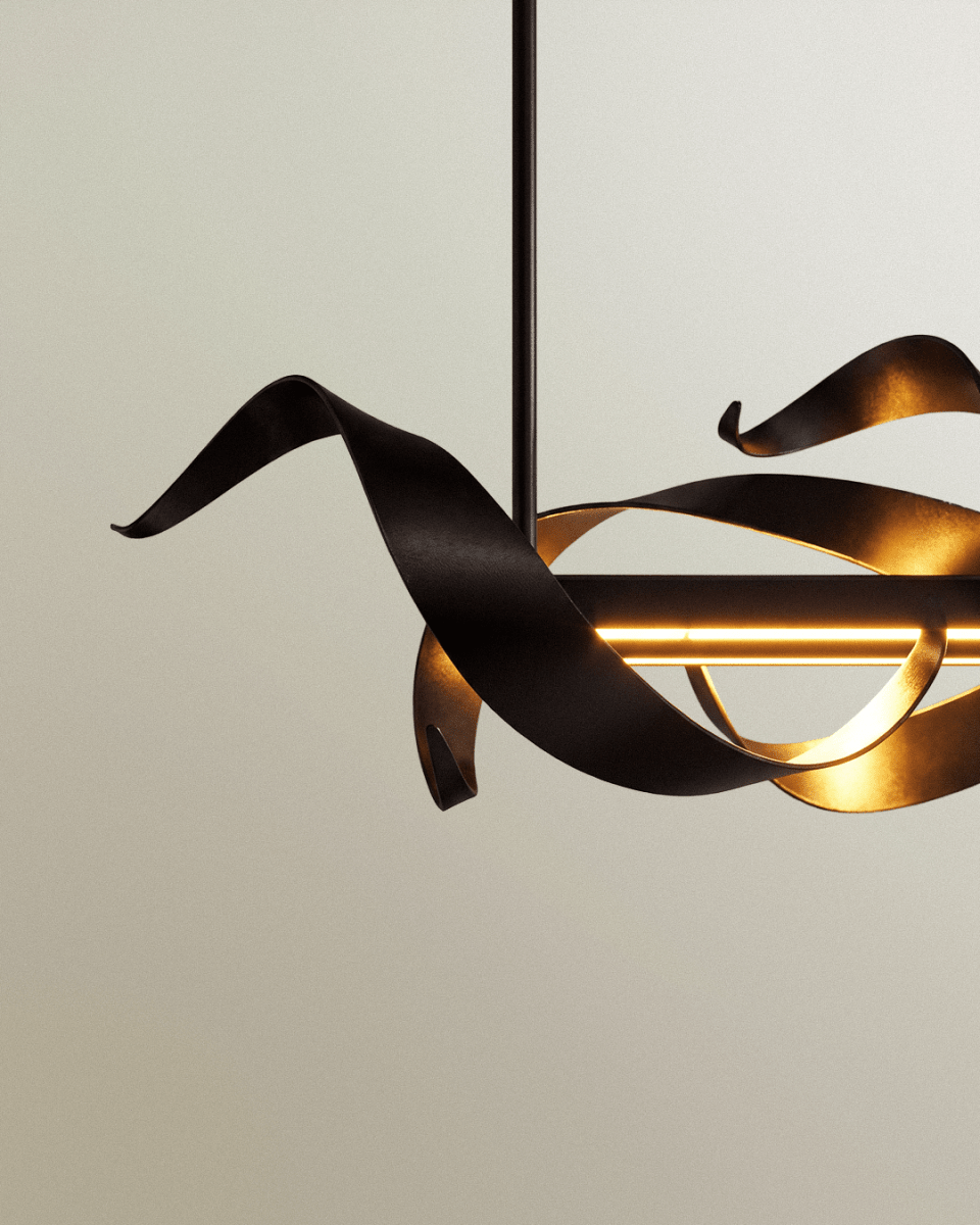 Clérachic close view of a black steel ribbon curling around a warm LED bar, the inner face showing a gold tone.