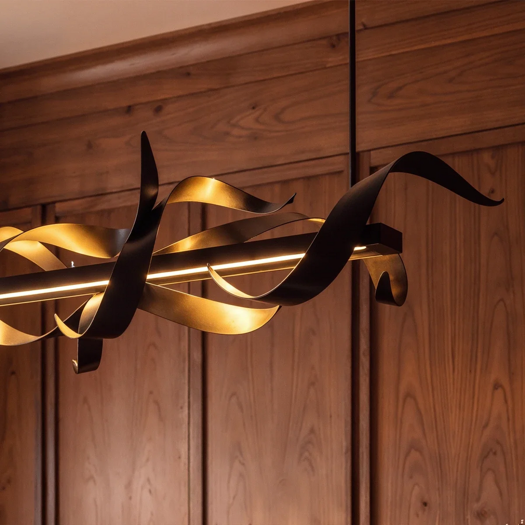 Clérachic close crop of black steel ribbons and a warm LED bar against walnut wall panelling, rod rising to the ceiling.