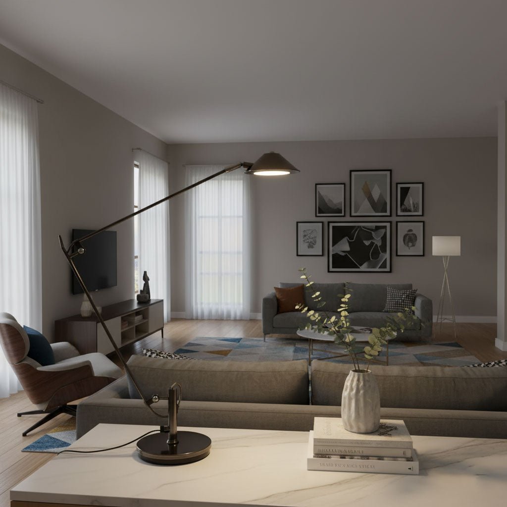 A Clérachic black arm lamp stands on a coffee table in a grey living room, its cone shade reaching out over the sofa.
