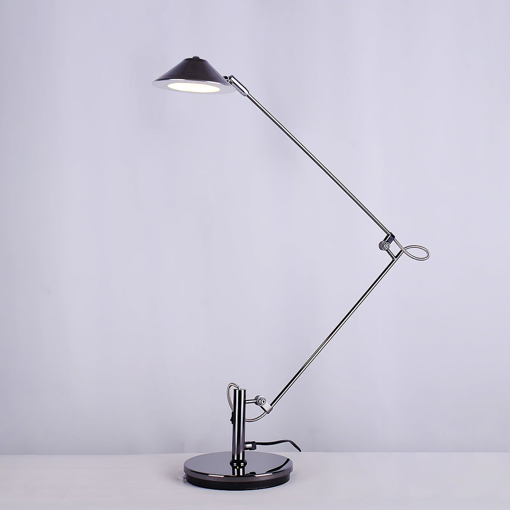 A Clérachic black arm lamp folded into a Z shape with its lit shade high on the left, on a soft lilac-grey backdrop.