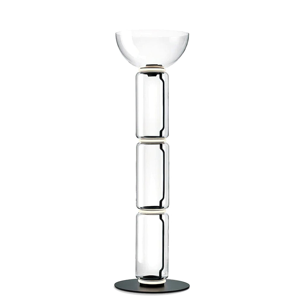 Clérachic floor lamp on white, three clear glass cylinders under a wide glass bowl, with a thin glowing ring at each join.