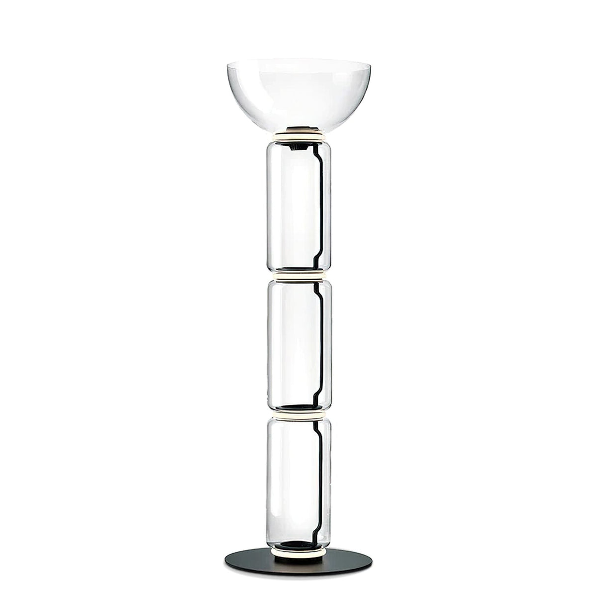 Clérachic floor lamp on white, three clear glass cylinders under a wide glass bowl, with a thin glowing ring at each join.