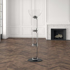 Clérachic floor lamp with a wide glass bowl on top, unlit, in a panelled room with a marble fireplace and a herringbone floor.