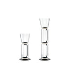 Two Clérachic floor lamps on white, a shorter one with a flared top and a taller one with two glass cylinders under a flared top.