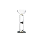 Clérachic floor lamp on a white backdrop, two glass cylinders under a wide glass bowl, on a round black base.