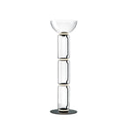 Clérachic floor lamp on white with a wide glass bowl on top of three stacked glass cylinders and a round black base.