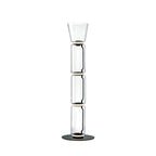 Clérachic floor lamp on white, three stacked glass cylinders under a small flared glass top, on a round black base.