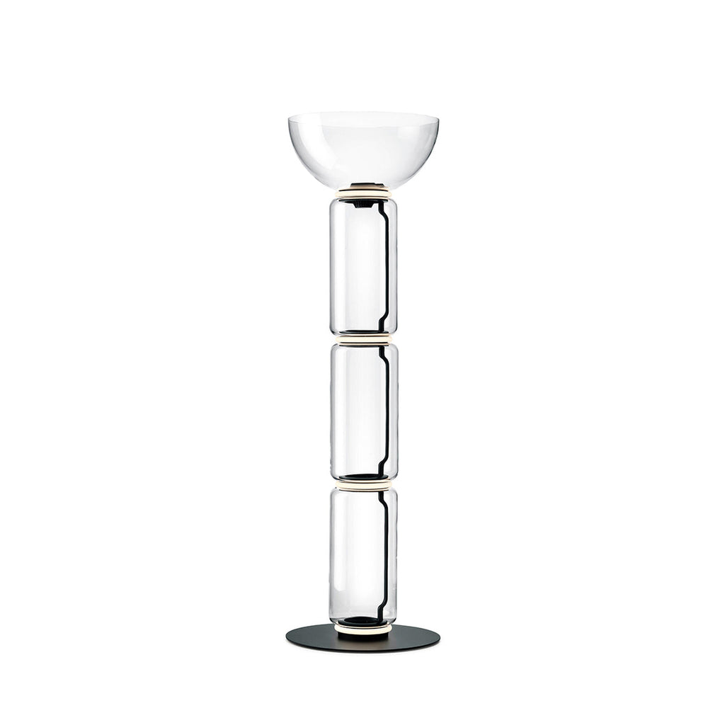 Clérachic floor lamp on white, three glass cylinders under a wide shallow glass bowl, on a round black base.