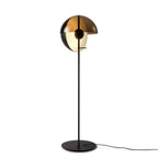 Black Clérachic floor lamp on a white background, its bronze-tinted dome open to show a pale globe above a thin stem and round base.