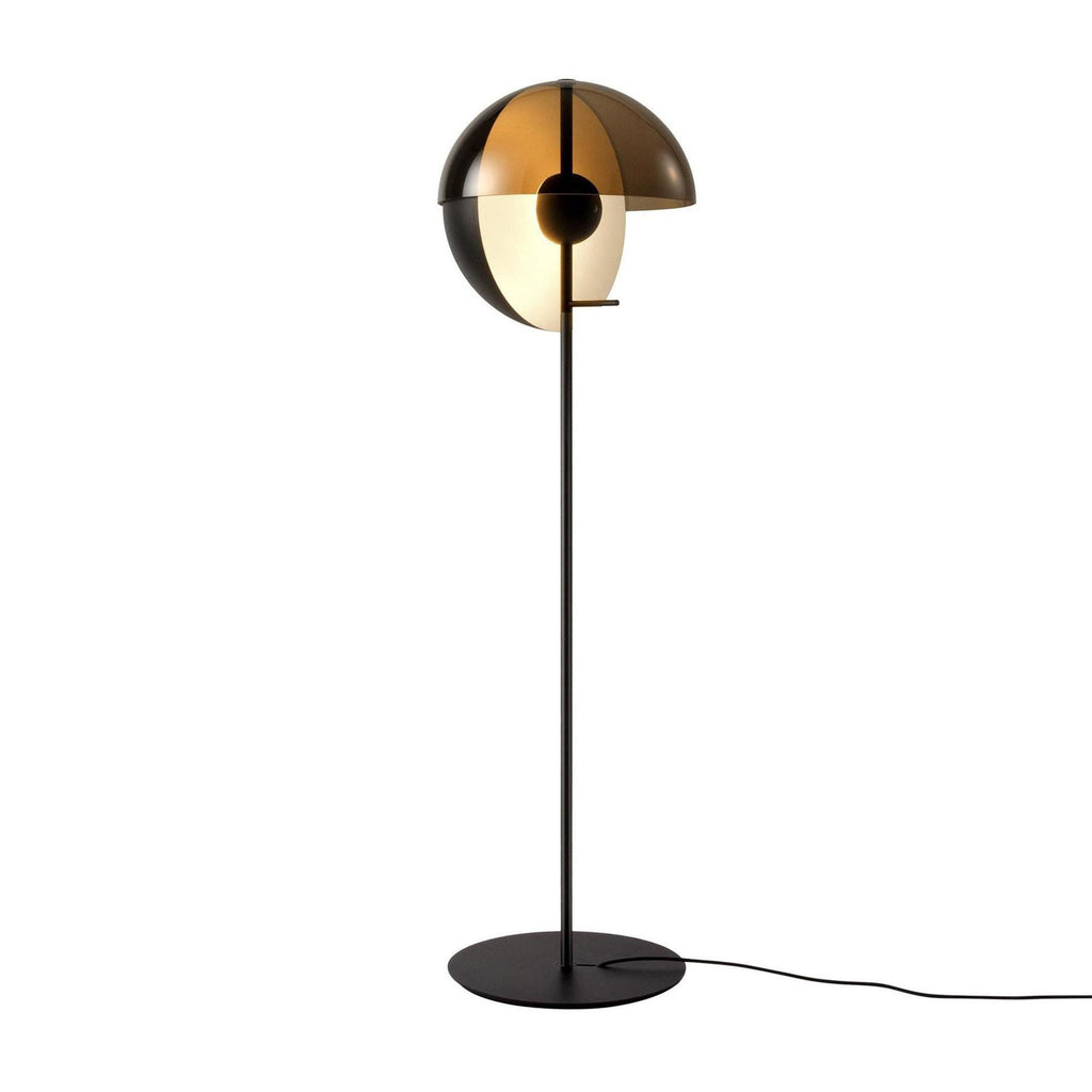 Close view of the black Clérachic floor lamp, the bronze dome open over a pale inner globe, on a plain white background.