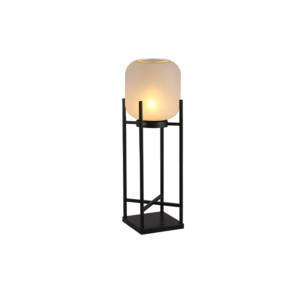 Mid-height Clérachic lantern lit on a white background, with a solar ring around the top of its frosted shade.