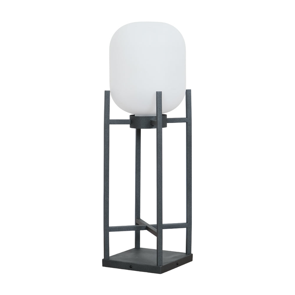 This Clérachic lantern unlit on a white background, with a milky white glass shade on a charcoal grey open frame.