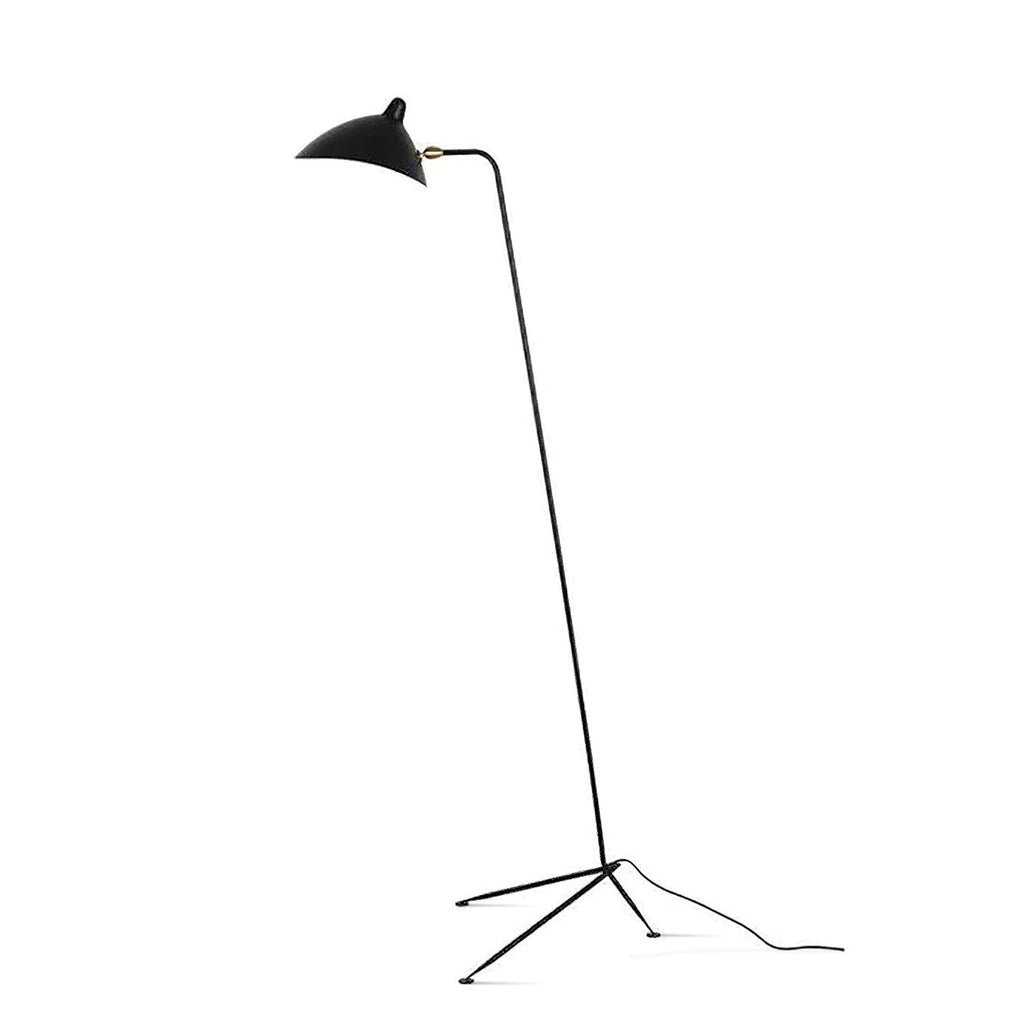 Clérachic black floor lamp on a plain white backdrop, with a tripod base, a thin stem and a small angled shade.