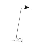 This Clérachic floor lamp with a tripod base and an angled black shade, shown on a white backdrop with a soft shadow.
