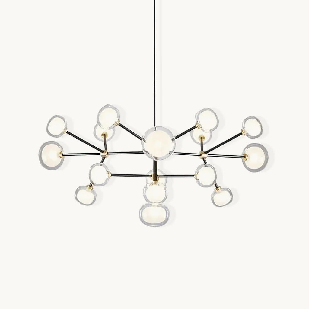 Black-framed Clérachic chandelier on a white backdrop, with brass joints and clear-rimmed glass globes branching from a central stem on a black rod.