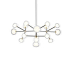 Black-framed Clérachic chandelier on a plain white backdrop, with clear and white glass globes in two tiers on thin black arms.