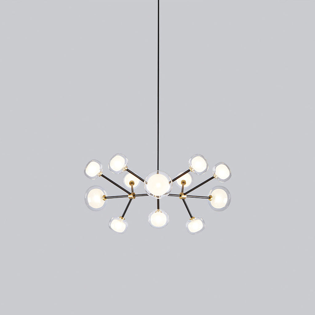 Small view of this Clérachic chandelier on a plain grey backdrop, hung from a thin black rod, with a wide ring of glass globes.