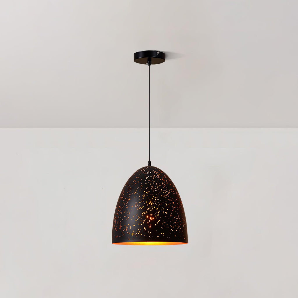 Tall bell-shaped Clérachic pendant with a perforated black shade, hanging from a ceiling plate against a white wall.