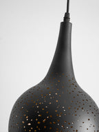 Close view of the slim neck and perforated shoulder of this Clérachic teardrop pendant, in matt black against light grey.