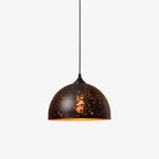 Wide Clérachic dome pendant with a perforated black shade and a gold rim, on a very pale grey backdrop.