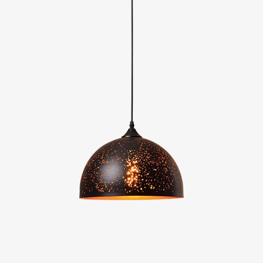 Wide Clérachic dome pendant with a perforated black shade and a gold rim, on a very pale grey backdrop.