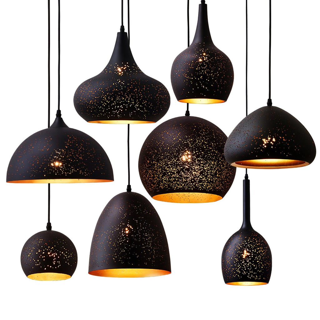 Clérachic pendants in teardrop, dome and bell shapes clustered together at varied heights, shown on a white background.