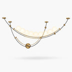 This Clérachic pendant on a plain white backdrop, a row of lit white globes cradled in black and gold curved arcs with a brass ball.