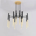 This Clérachic chandelier hangs from a brass-finish canopy, its black rods fanning out from the centre, in a plain white room.