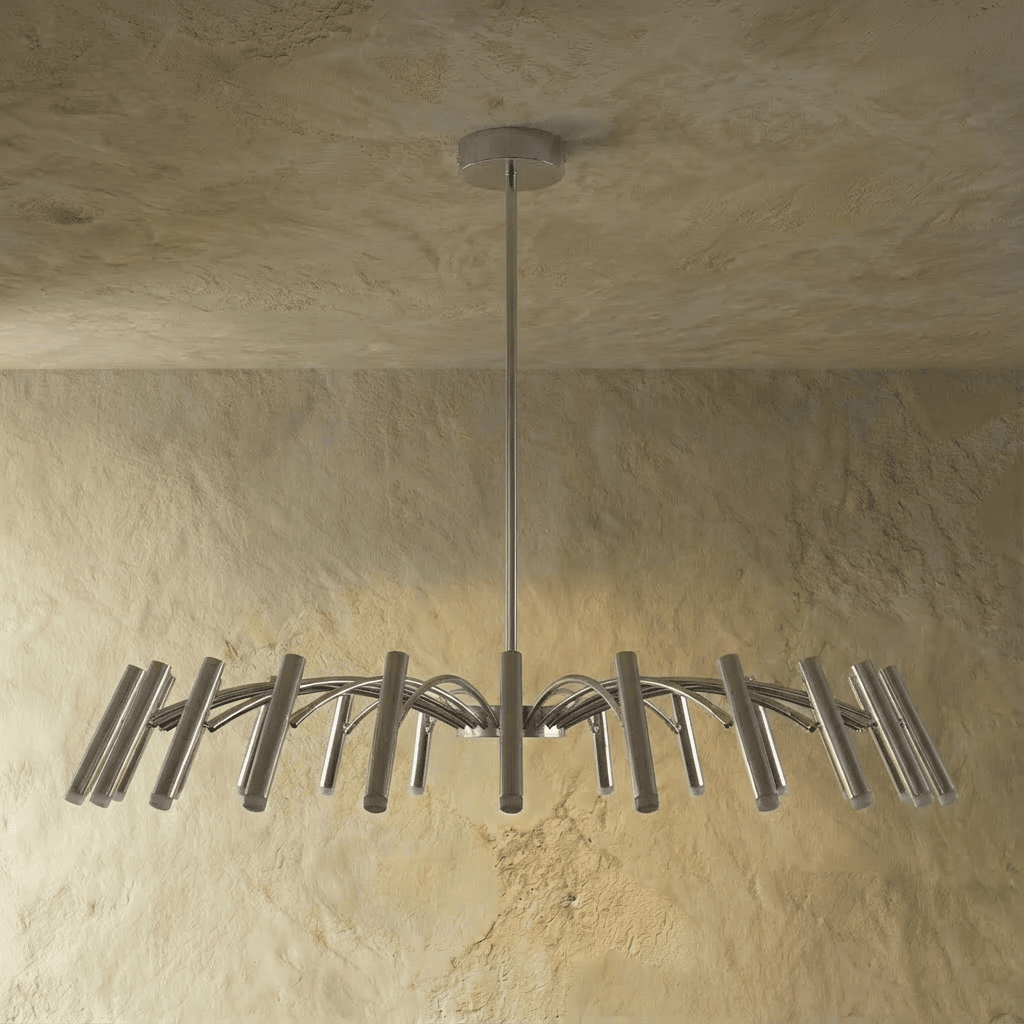 Another angle of the fuller silver-toned chandelier shows its dense arm spread and tube heads against a plain backdrop, Clérachic hero shot.