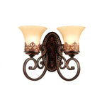 A two-arm Clérachic wall lamp on white, with two cream glass bell shades and a decorative oval backplate.