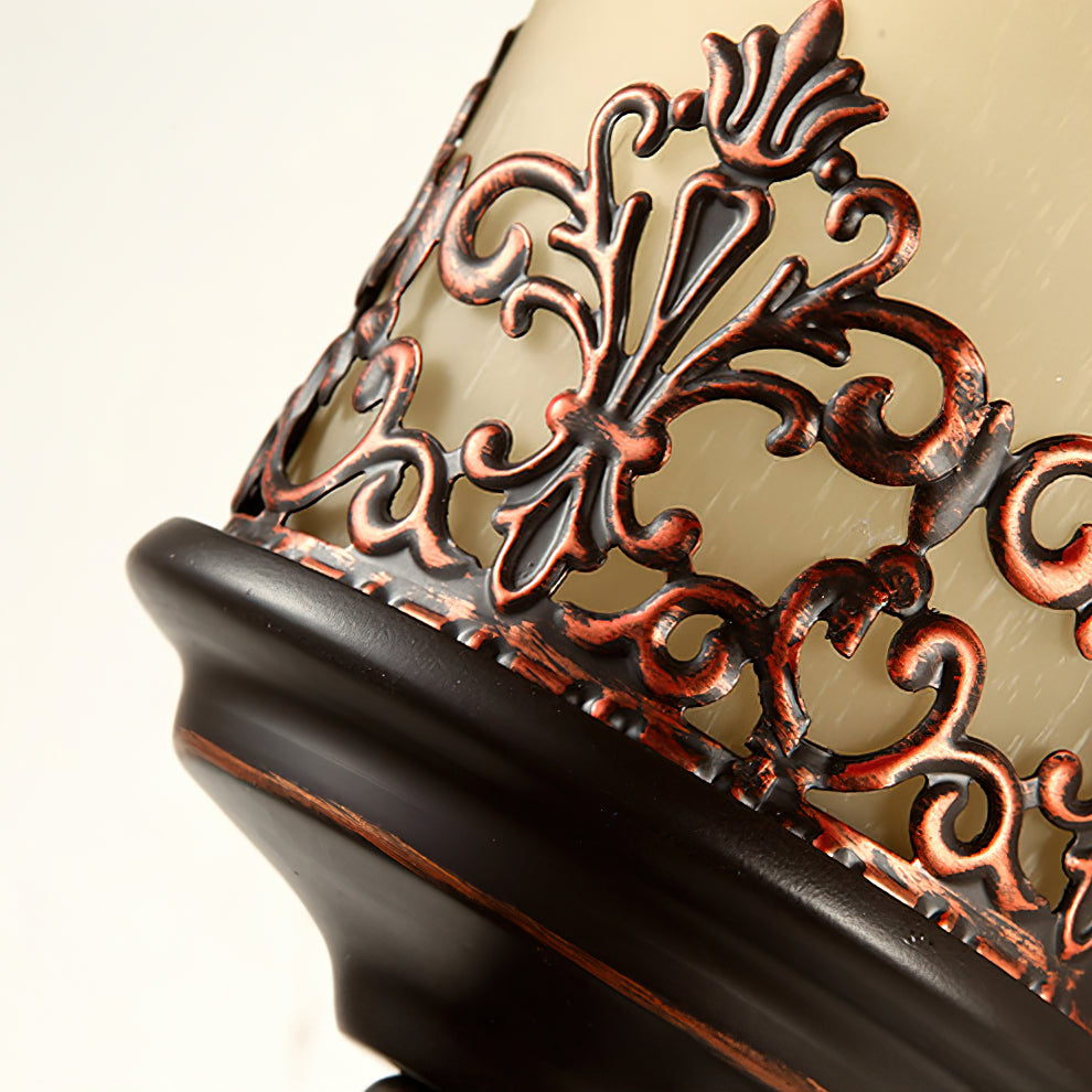 Close view of the filigree band around the lower rim of this Clérachic lamp shade, with its copper-edged scrollwork.