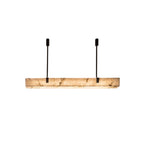 Front view of the Clérachic Black Linear Chandelier, showing the alabaster bar's natural veining lit from within.