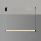 This Clérachic linear pendant on a two-tone grey backdrop, its lit tube running between two thin cables beneath a black canopy.