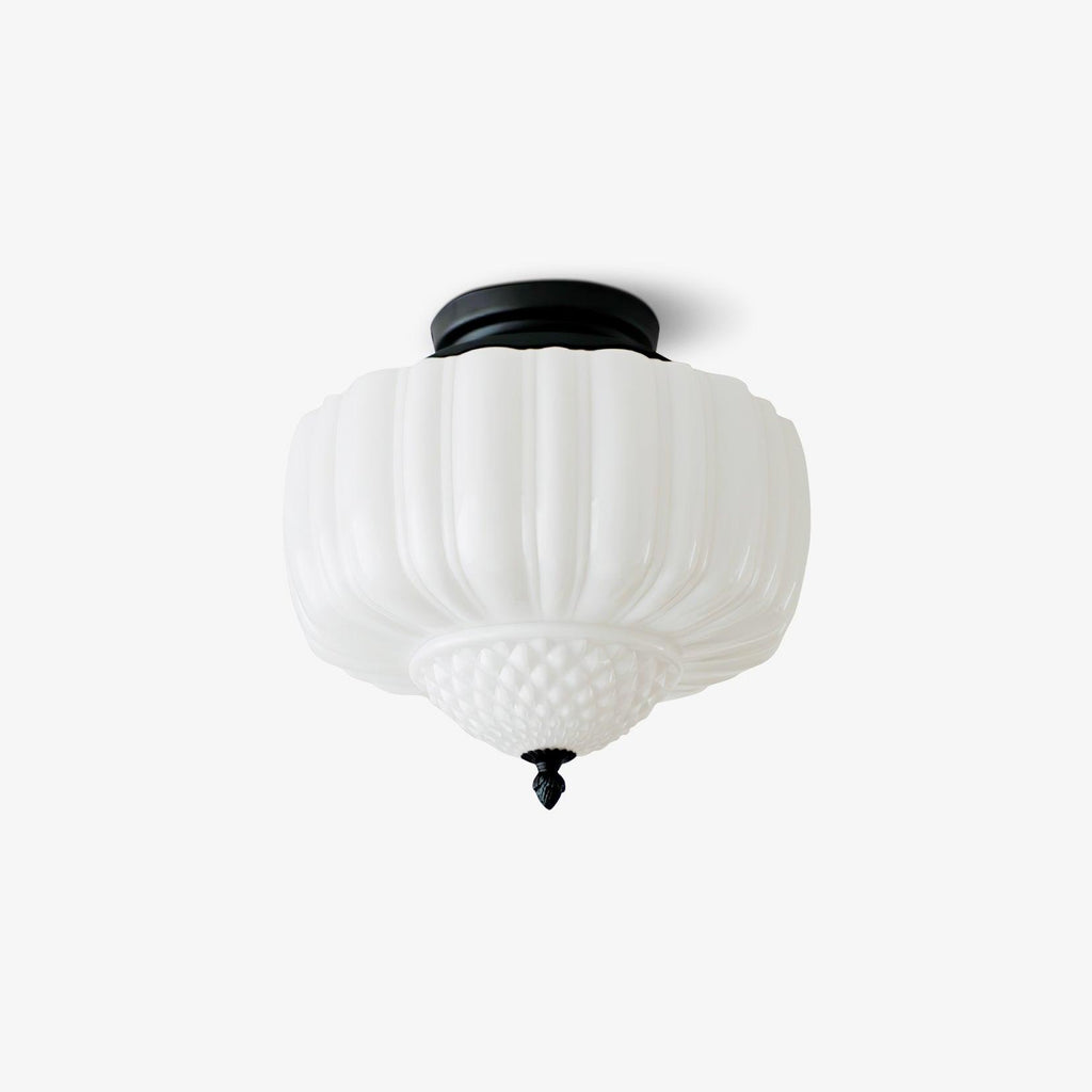 Ceiling light from Clérachic with a ribbed white glass shade and black canopy, shown unlit on a light grey backdrop.