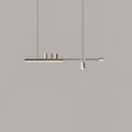 Front view of this Clérachic pendant against a flat grey wall, its LED bar lit and two thin cables rising out of frame.