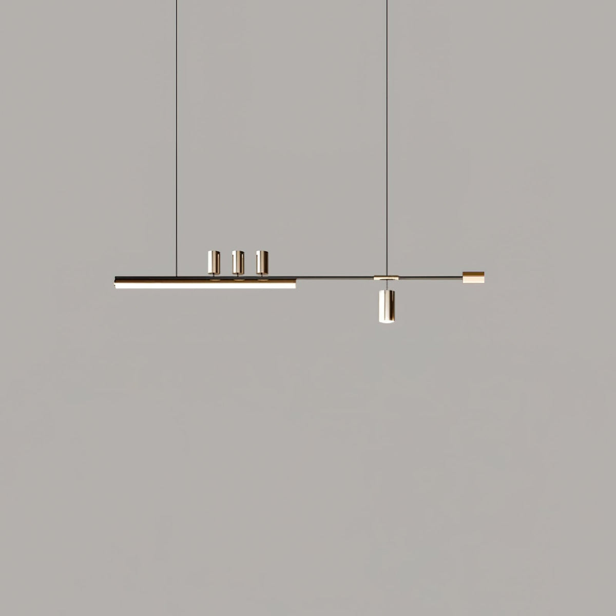 Front view of this Clérachic pendant against a flat grey wall, its LED bar lit and two thin cables rising out of frame.