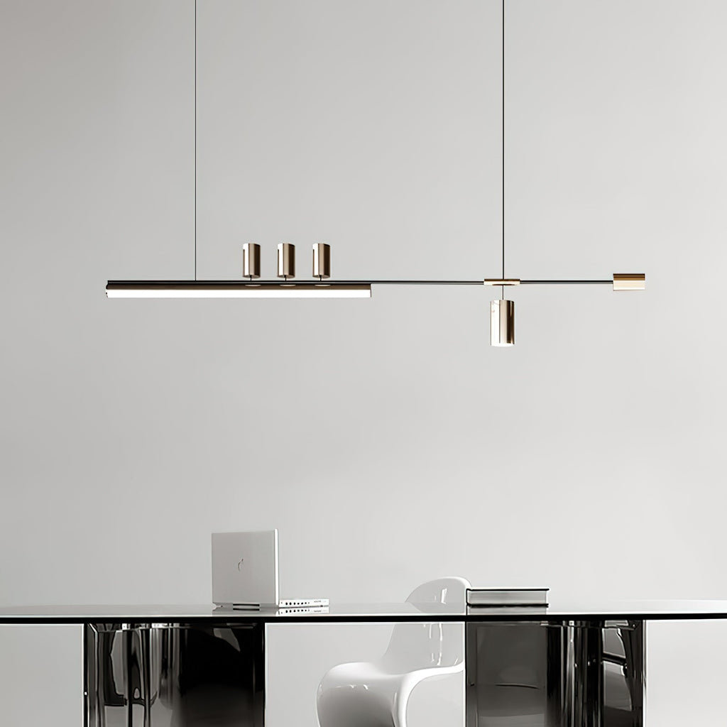 Bar pendant from Clérachic above a glass-topped table with a white moulded chair and a laptop, against a plain grey wall.