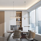 Clérachic bar pendant over a wooden desk in a bright office, with leather chairs, a monitor and tall windows.