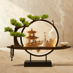 Clérachic incense-burner lamp lit warm, a standing white figure and pagoda with prayer beads on both sides.