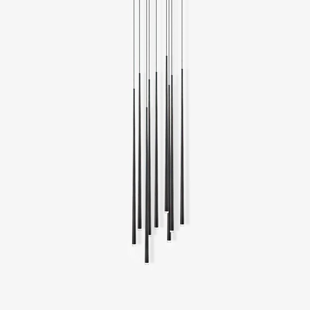 Staggered black tube pendants with fine cords on a near-white background, shown unlit, a Clérachic pendant.