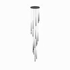 Dense round-canopy cluster of black tapered pendants, lengths staggered from short to long, on white, from Clérachic.
