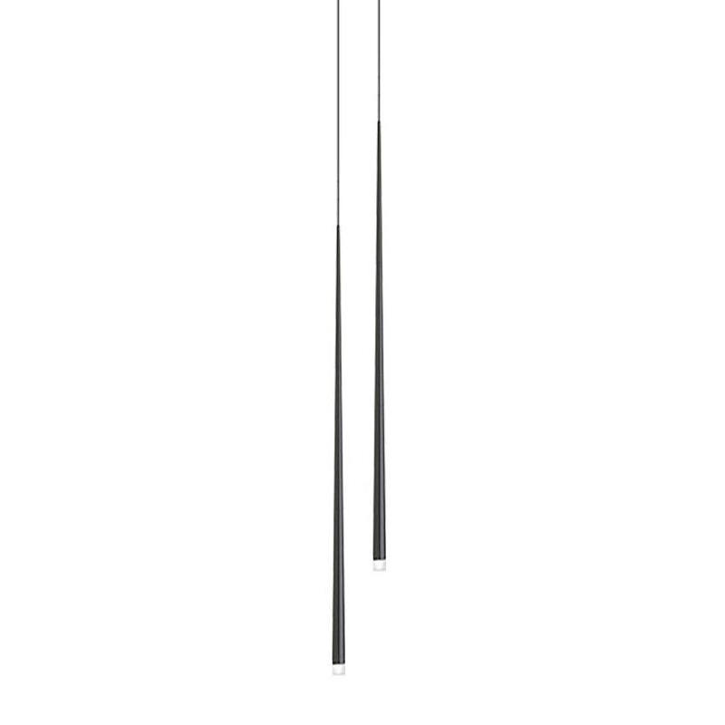 Pair of long black cone pendants at slightly different drops, tips with a clear lens, on white, a Clérachic pendant.