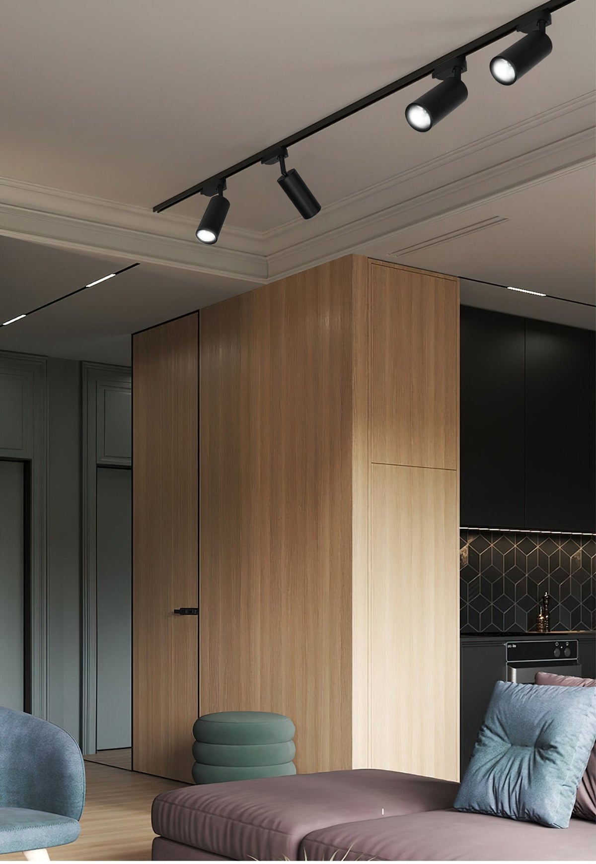 Clérachic black track with several spotlight heads on a ceiling above a timber-clad column and a mauve sofa.